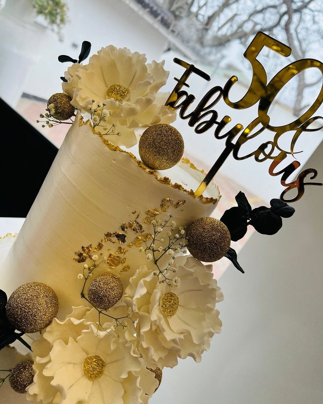 Onyx Gold Cake by Baked by Buhlenkosi