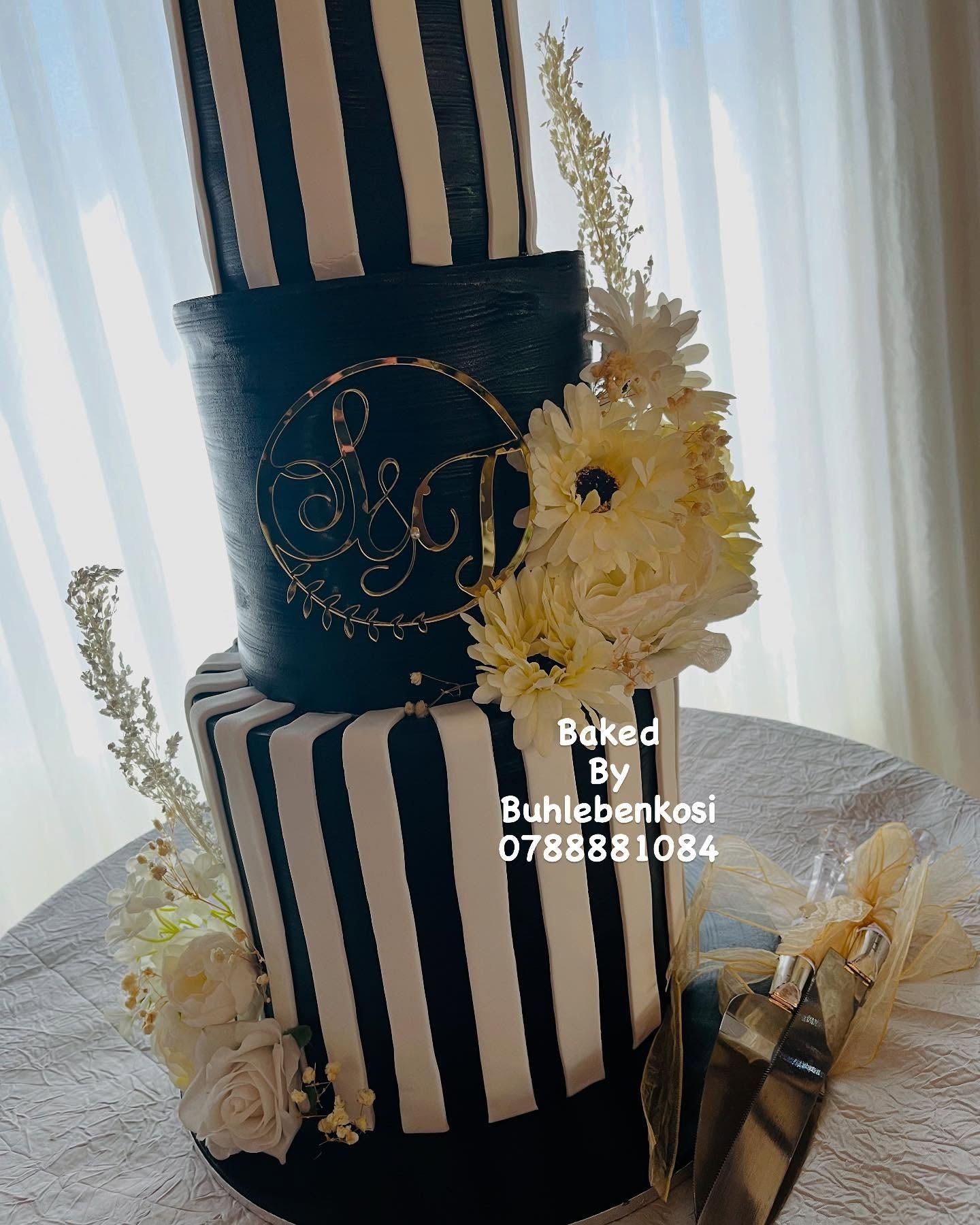 Monochrome Gold Cake by Baked by Buhlenkosi